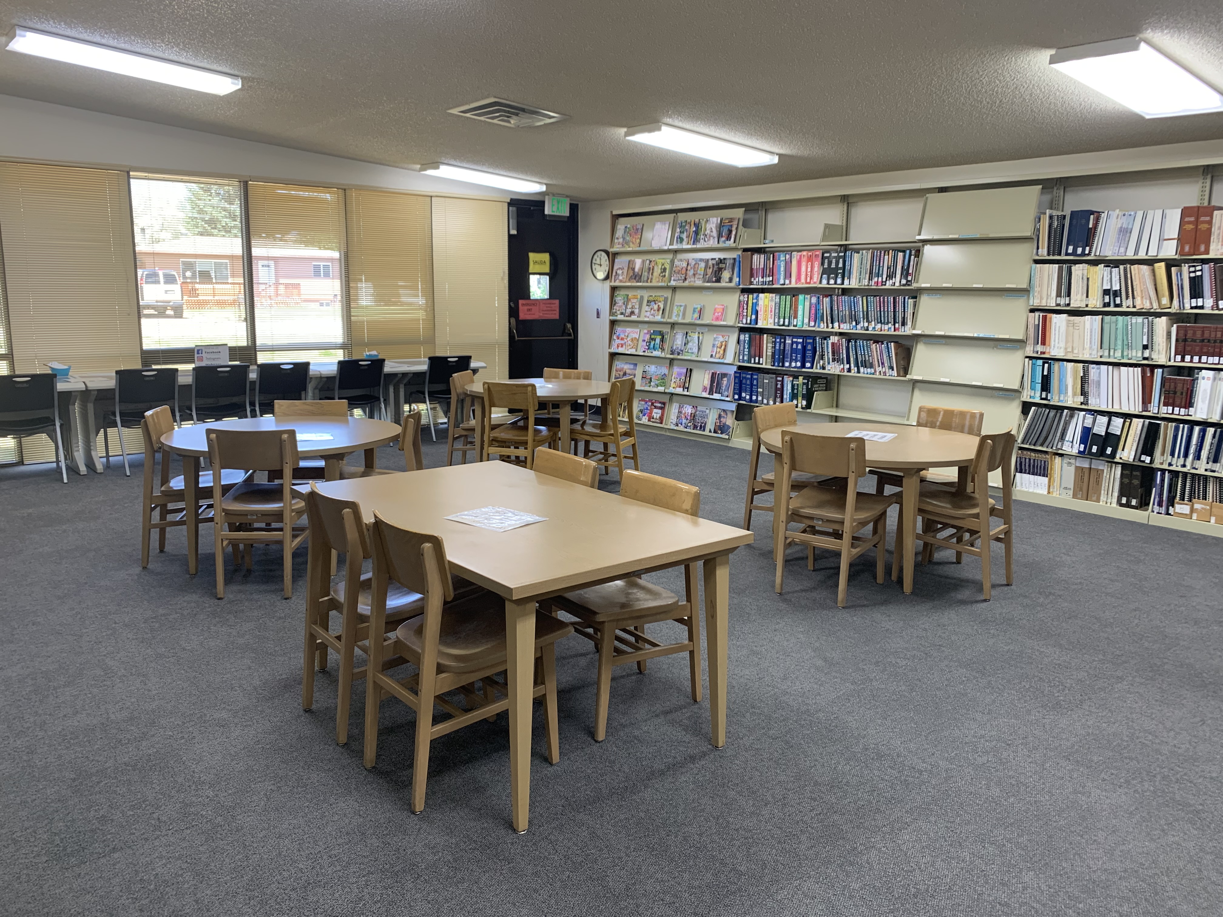 Library work area with tables and chairs