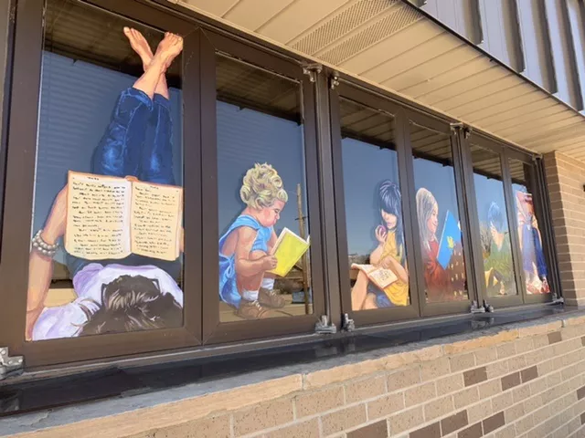Paintings in library window